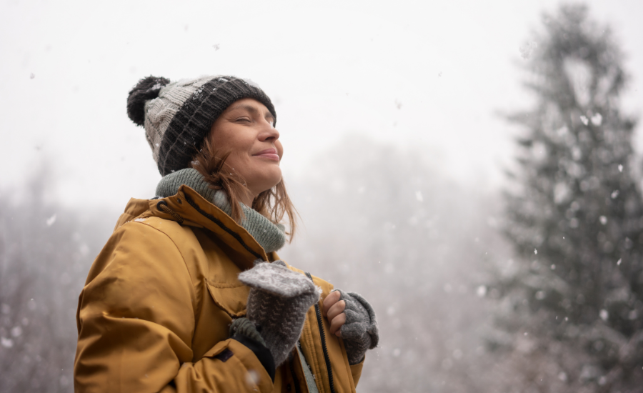 Chiropractor adjusting patient’s spine for winter wellness and improved mobility